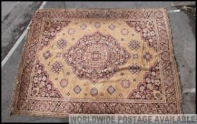 An excellent large early 20th century handmade Persian rug having beige,