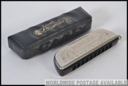 A vintage Hohner Chrometta 10 harmonica NR253 complete in the case in excellent condition