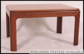 A 1970's retro G-Plan teak wood occasional side table having squared legs with chamfered edges