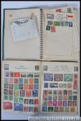 Two vintage stamp albums, each filled with assorted GB and overseas stamps.