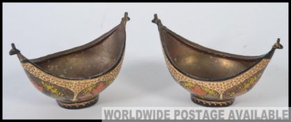A pair of Japanese oriental early 20th century composition on copper made pots.