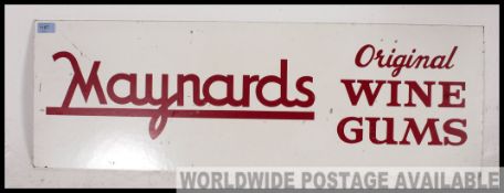 A retro 20th century point of sale painted wooden shop advertising sign for Maynards Wine Gums,