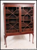 A 19th century mahogany bookcase on stand cabinet.