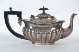A silver hallmarked teapot bearing hallmarks for Chester by William Aitken, date letter R.