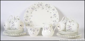 A chintzy bone china tea service from Wedgwood in the ' April Flowers ' service,
