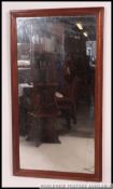 A Victorian large pine wall mirror.
