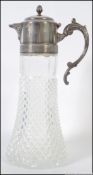 A good quality large silver plate and cut glass claret jug.