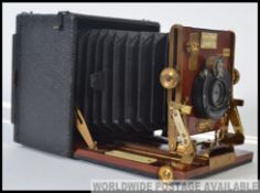 An early 20th century Sanderson quarter-plate field camera, Junior Model camera,