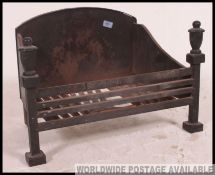 A vintage mid 20th century cast iron open Victorian style fire grate,