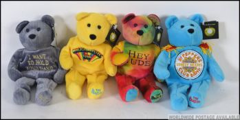 A set of 4 unopened Beatles Beanies complete with the tags etc ( see illustrations )