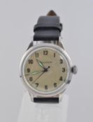 A gentlemans vintage JAEGER LE COULTRE wristwatch having a circular steel dial with coloured