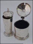 A hallmarked silver Sampson & Morden (S&M) part condiment set,