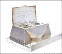 A stunning Art Deco silver hallmarked twin capstan inkwell.