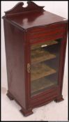A Victorian mahogany pedestal music cabinet.