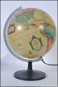 A contemporary retro style light up desk top globe by Scanglobe in working order H45cm