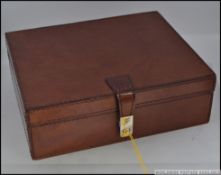A good quality 20th century ladies fully fitted leather jewellery box in tan brown leather W21cm