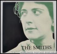 The Smiths ' Girlfriend In A Coma ' mispressed green sleeve.