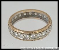 A 9ct gold and diamond eternity ring, the ring with approx 50pnts of diamonds. Total weight 3.