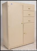 A retro 1970's painted tallboy chest of drawers / cabinet.