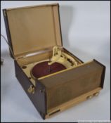 A retro vintage 1950's Champion two tone vinyl record playes having hinged top with inset Collaro