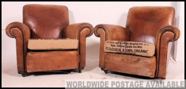A fantastic pair of 1930's vintage leather club arm chairs,