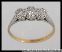 An 18ct gold and platinum vintage ladies diamond ring.