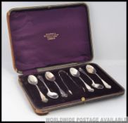 A cased set of Victorian silver hallmarked tea spoons and sugar tong set, Sheffield assay mark,