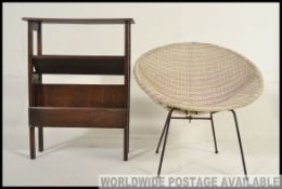 A retro weave atomic 1960's bedroom chair together with a vintage oak book trough bookcase cabinet