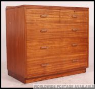 A mid centure AIr Ministry chest of drawers having inset original formica top with stub gallery