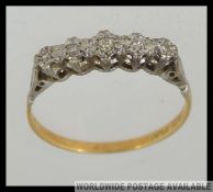 An 18ct gold and platinum vintage ladies diamond ring.