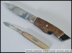 A silver hallmarked mother of pearl handled fruit knife,