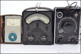A Vintage leather cased Megger together with a Universal Avo Meter and a Model CR50 meter