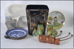 A mixed lot to include a pair of ceramic temple dogs, a retro Japanese tin bin,