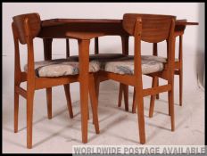 Retro vintage table in soft rectangular form and four chairs.