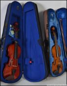 2 Stentor trainer violins in excellent condition complete in the original vinyl carry cases