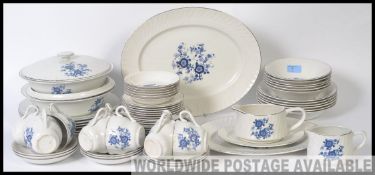 A Wedgwood blue and white royal blue ironstone dinner and tea service comprising cups, saucers,