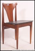 A set of 4 retro 1970's teak wood and black vinyl upholstered dining chairs with fabulous angular