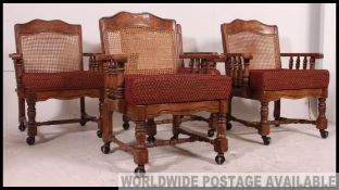 An antique oak style French set of Bergere dining chairs having caned backs with padded seats on