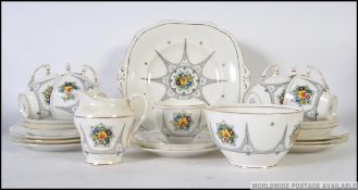 A Wetley Staffordshire porcelain chintz pattern part tea service comprising cups, saucers,