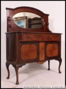 A 1930's Art Deco flame mahogany mirror back sideboard.