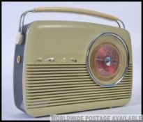A fantastic mid 20th century wooden cased Bush type TR 82C valve radio,