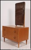 A 1960's retro upright blond oak dressing table by Meredew.
