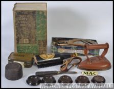 A mixed dealers lot to include several curio's such as a Guinness clothes brush, M.A.