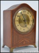 An Edwardian HAC - Hamburg America Clock mahogany inlaid mantel clock with engine turned face