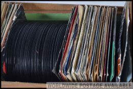 A vintage jukebox collection of 45rpm vinyl record singles,