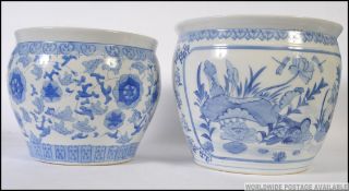 2 large Chinese blue and white ceramic carp bowls / planters with decorative designs having greek