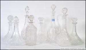 A collection of decanters to include stoppers.