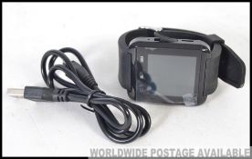 A smart watch bracelet with built in USB, wireless pairing,