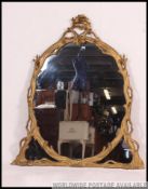 A large 19th century gilt rococo wall mirror.