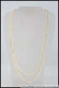 A ladies pearl necklace silver clasp. Total weight 48.
